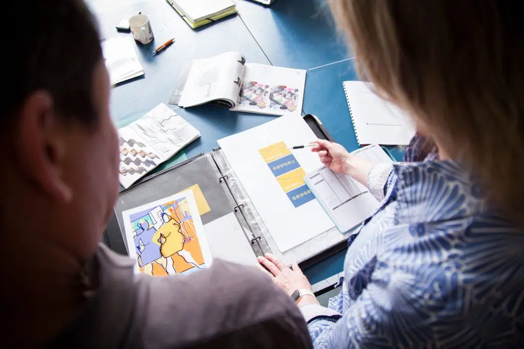 digi-training helping a client with their portfolio